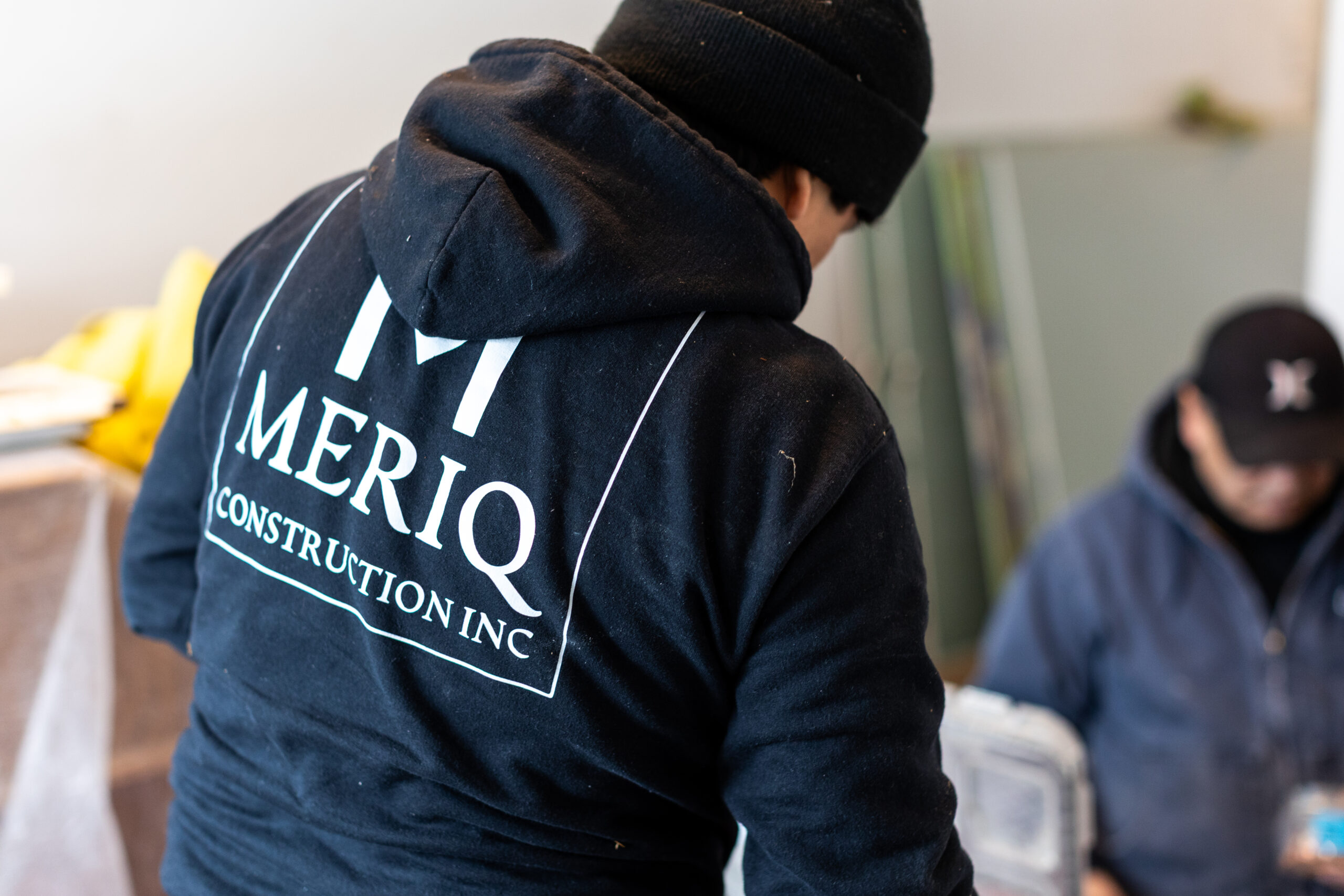 Meriq Construction Inc team members working on an interior remodeling project