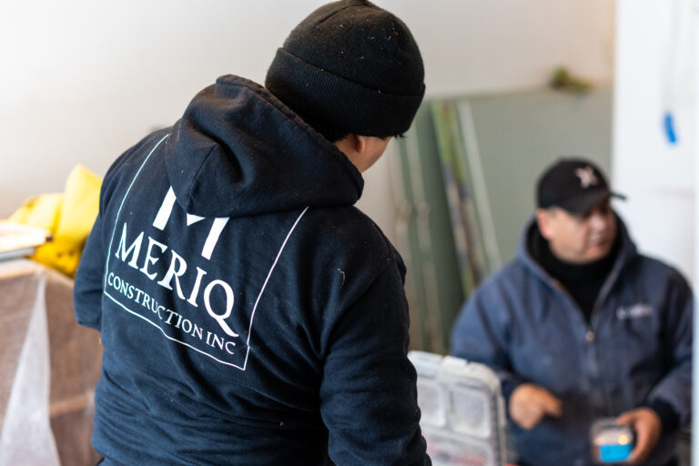 Meriq Construction Inc team members working on an interior remodeling project